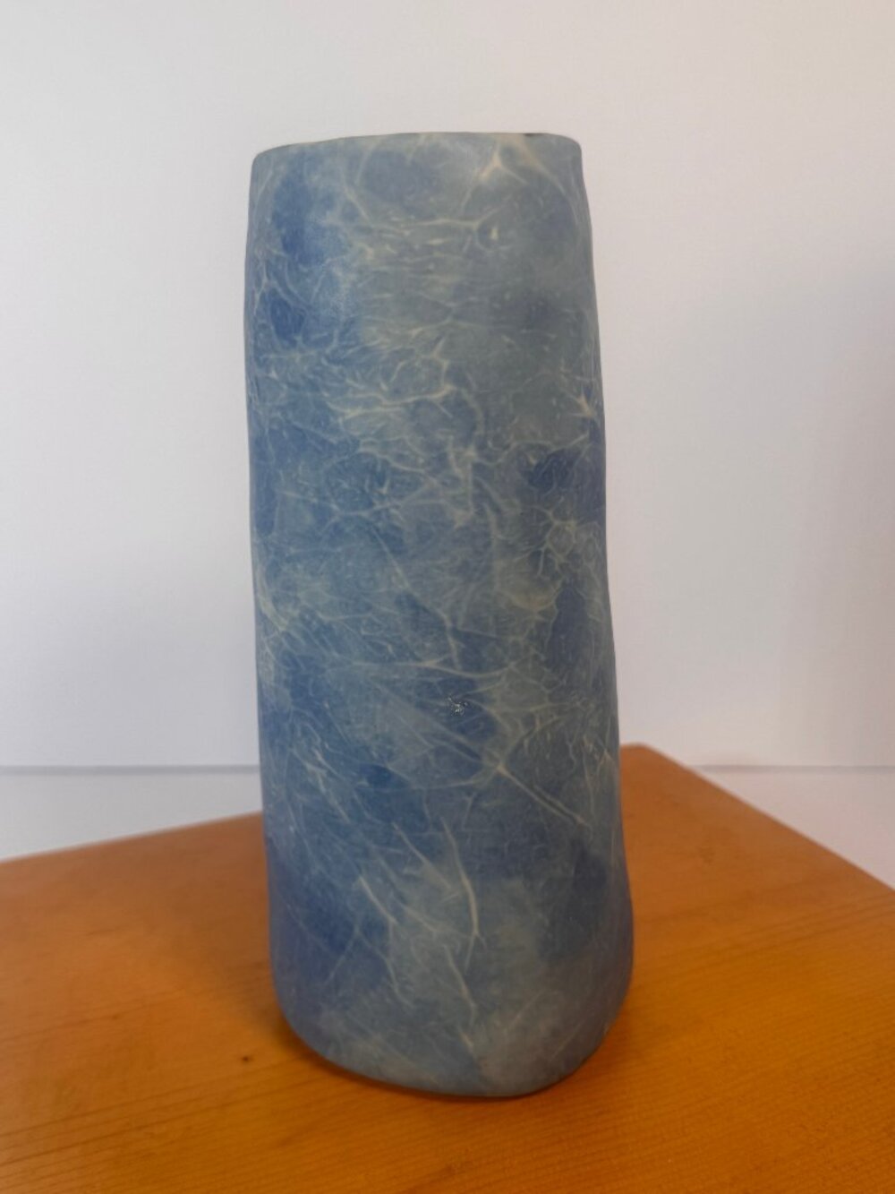 Bud vase or cylinder with blue and white soft cloud like marbled pattern